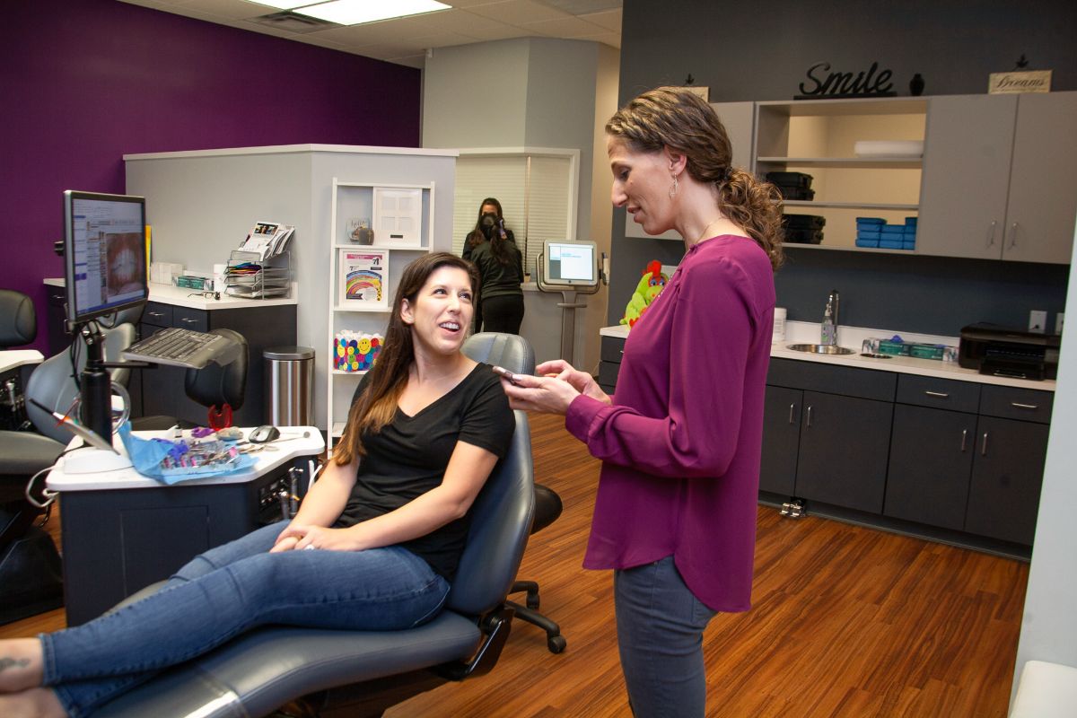 Dr. Rhoads talking with a patient